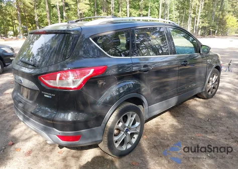 2014 Ford Escape Titanium z USA, uszkodzony, nr VIN 1FMCU9JX5EUD56425